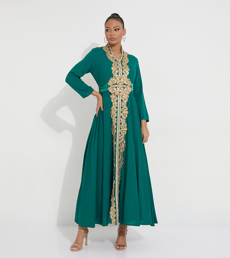 Golden embroidery line in the meddle of kaftan