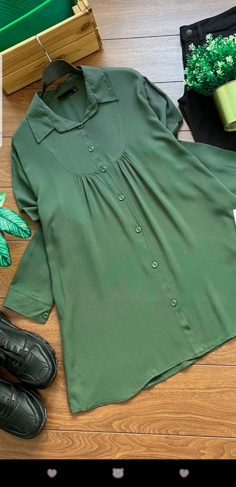 wide shirt with chest bottened and puff sleeves