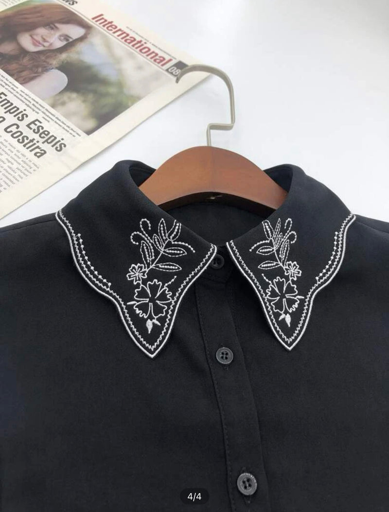 White embroidery Black collar