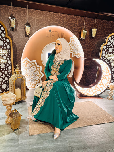 Golden embroidery line in the meddle of kaftan