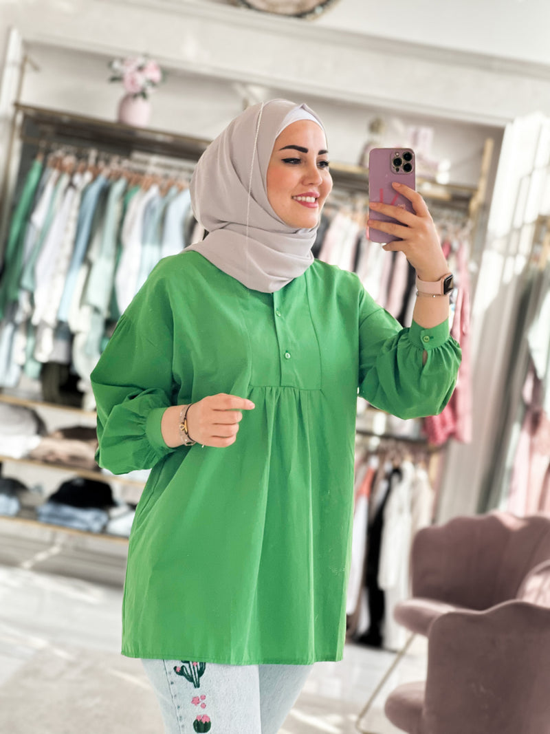 wide shirt with chest bottened and puff sleeves