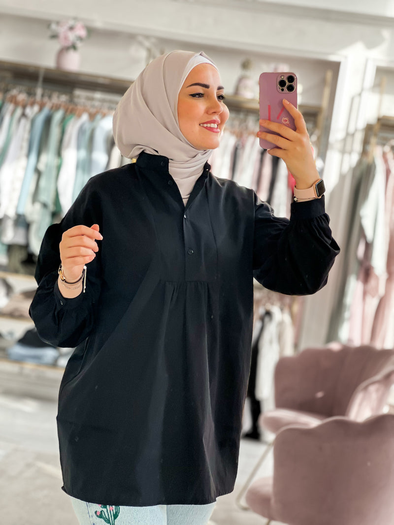 wide shirt with chest bottened and puff sleeves