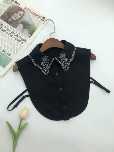 White embroidery Black collar