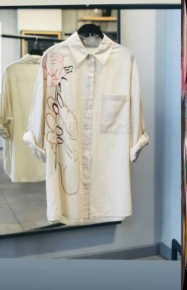 Off White shirt with needle work flower