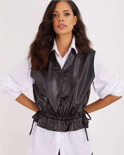 White shirt with leather vest